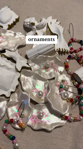 some ornaments I made with friends or for friends for christmas! 🦪♥️🪩✨🎄🩶🪩🫶🏻💌 #christmasornaments #diyornaments #airdryclay #christmascrafts #oysterpearl #pastaornament #initialornament 