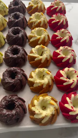 MINI SWIRL CAKES #cake #swirl #chocolate #food #Recipe #tiktokfood #fy #fyp #foryou #foryoupage #trending #viral RED VELVET BATTER 2 eggs (medium) 100 g granulated sugar 16 g vanilla sugar (2 sachets) 85 ml sunflower oil 85 g yogurt 1 tsp red food coloring gel 115 g flour (all-purpose) 2.5 g baking powder 5 g cocoa powder  TOPPING 25 ml heavy cream 75 g white chocolate  CARROT BATTER 2 eggs (medium) 50 g brown sugar 40 g granulated sugar 8 g vanilla sugar (1 sachet) 2 g cinnamon powder (⅔ teaspoon) 95 ml sunflower oil 150 g carrots 40 g walnuts 120 g flour (all-purpose) 2.5 g baking powder  TOPPING 25 ml heavy cream 75 g white chocolate  CHOCOLATE BATTER 2 eggs (medium) 50 g dark brown sugar 50 g granulated sugar 16 g vanilla sugar (2 sachets) 85 ml sunflower oil 100 ml milk 80 g flour (all-purpose) 2.5 g baking powder 30 g cocoa powder  TOPPING 40 ml heavy cream 40 g dark chocolate chocolate sprinkles    PISTACHIO BATTER 2 eggs (medium) 100 g white sugar 8 g vanilla sugar (1 sachet) 90 ml sunflower oil 75 ml milk 40 g pistachios (unsalted) 120 g flour (all-purpose) 2.5 g baking powder  TOPPING 80 g pistachio paste edible rose petals   RED VELVET BATTER    Break the eggs into the bowl. Add sugar and vanilla sugar, and mix for 1 minute.  Add sunflower oil and mix until well combined. Add yogurt and red food coloring gel, mix well. Sift the flour, baking powder, and cocoa powder into the bowl. Mix until smooth.  Grease the mini swirl baking mold and add the red velvet batter (65-70 grams each).  Bake the red velvet swirl cupcakes in a preheated oven at 170°C for 17-20 minutes. Keep a close eye on the baking time, as each oven varies.  Heat heavy cream (25 ml) until near boiling. Add white chocolate pieces (75 g). Let it sit for 1 minute and then stir until smooth. Transfer the white chocolate ganache to a piping bag and let it cool slightly.  Garnish the red velvet swirl cupcakes with white chocolate ganache and red velvet crumbs.    CARROT BATTER    Break the eggs into the bowl. Add brown sugar, granulated sugar, vanilla sugar, and cinnamon powder. Mix for 1 minute.  Add sunflower oil and mix until combined. Add grated carrot and chopped walnuts. Mix until combined. Sift the flour and baking powder into the bowl. Mix until smooth.  Grease the mini swirl baking mold and add the carrot batter (65-70 grams each).  Bake the carrot swirl cupcakes in a preheated oven at 170°C for 17-20 minutes. Keep a close eye on the baking time, as each oven varies.  Heat heavy cream (25 ml) until near boiling. Add white chocolate pieces (75 g). Let it sit for 1 minute and then stir until smooth. Transfer the white chocolate ganache to a piping bag and let it cool slightly.  Garnish the carrot cupcakes with white chocolate ganache, chopped walnuts, and a candy carrot.  CHOCOLATE BATTER    Break the eggs into a bowl. Add dark brown sugar, granulated sugar, and vanilla sugar. Mix for 1 minute.  Add sunflower oil and milk. Mix well. Sift the flour, baking powder, and cocoa powder into the bowl. Mix until a smooth batter forms.  Grease the mini swirl baking mold and add the chocolate batter (65-70 grams each).  Bake the chocolate swirl cupcakes in a preheated oven at 170°C for 17-20 minutes. Keep a close eye on the baking time, as each oven varies.  Heat heavy cream (25 ml) until near boiling. Add pure chocolate pieces (75 g). Let it sit for 1 minute and then stir until a smooth mixture is obtained. Transfer the chocolate ganache to a piping bag and let it cool slightly.  Garnish the chocolate cupcakes with the pure chocolate ganache and sprinkle some chocolate sprinkles on top.    PISTACHIO BATTER    Break the eggs into a bowl. Add white sugar and vanilla sugar. Mix for 1 minute.  Add sunflower oil and milk. Mix well. Add ground pistachios and mix until smooth. Sift the flour and baking powder into the bowl. Mix until smooth.  Grease the mini swirl baking mold and add the pistachio batter (65-70 grams each).  Repeat the same steps as before.