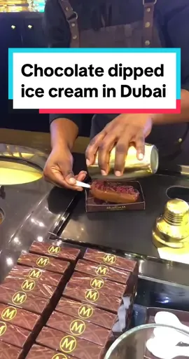 Chocolate dipped ice cream in Dubai at Mall of the Emirates!! Magnum ice cream #foodstreet #foodreview #foodworld #travel #icecream #dubai #fyp 