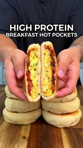 High Protein Breakfast Hot Pockets🍳🥓 Easy Meal Prep 🔥 Only 328 Calories With 32g Protein! (Macros: Per Serving - 8 Total) 328 Calories 29.5gC | 8gF | 32gP Ingredients:  120g Diced Short Cut Bacon (can be substituted for beef bacon, turkey bacon or your bacon of choice) 6 Eggs & 150g Egg Whites (whisked - or 8 regular eggs) 400g Plain All Purpose Flour (Vetta Smart Plain Flour - can be substituted for self raising flour) 420g Low Fat Greek Yoghurt 2 Tsp Baking Powder Garlic Powder, Onion Powder, Salt & Black Pepper 160g Low Fat Grated Cheese (20g per hot pocket - Bega 50% Less Fat Grated Cheese) Chives Don’t forget to check out my digital cook book for more delicious & easy recipes! 👨🏻‍🍳📖 Reheat instructions: Microwave = 3 - 5 Minutes (flip half way) Air Fryer = 5 - 10 Minutes 180C / 180F Oven = 5 - 10 Minutes 200C / 400F IMPORTANT NOTES: If you find yourself have trouble forming the dough from it being too sticky, start by adding the flour first then slowly add the yoghurt & mix it together. Depending on the yoghurt brand some contain less or moisture than others causing it to be stickier. If this happens slowly add more flour until you reach a consistency you can work with & make sure to add some flour to your hands as well. #breakfast #hotpockets #breakfastideas #mealprep #cheese #lowcalorie #highprotein #highproteinmeals #EasyRecipe #weightloss #Fitness #Foodie 
