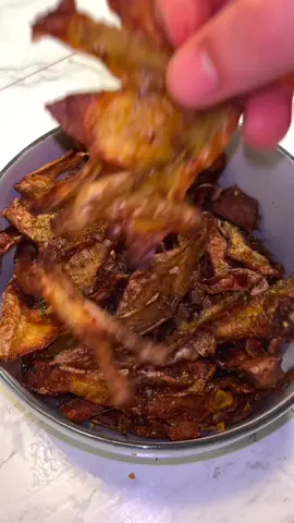 Crispy Potato Peels⬇️ 5 oz (140 g) potato peels  2 tbsp olive oil   Seasoning: -salt -black pepper -paprika -garlic -oregano -rosemary * Clean and scrub potatoes, removing blemishes and sprouts with a paring knife. * Peel with a peeler to preserve flesh. * Soak peels in cold water for 30 mins to reduce starch for crispiness. * Rinse and thoroughly dry peels using a towel or salad spinner; optionally bake for 5 mins at 200ºC/400ºF or dehydrate briefly. * Lay peels on a baking sheet, lightly oil, and season as desired. * Bake at 200ºC/400ºF for 15-18 mins, then broil briefly for extra crispness, watching to prevent burning. * Add extra seasoning if desired and enjoy   ⠀ #veganmeal #asmr #asmrfood #foodasmr #asmrrecipe #asmrreceipe #veggierecipes #patatas #EasyRecipes #vegan #veggie #veganrecipes #Recipe #veganbreakfastideas #veganesessen #veganesrezept #quicksnack #zerowaste #crispypotatoes #plantbasedfood #veganlunch #veganfood #veganrecipe #potatopancakes #veganfoodie #viralrecipe #easysnack #vegetarianrecipes #potatorecipes #potatopeel #vegetarian #kartoffel #potatosnacks #EasyRecipe #vegandinner