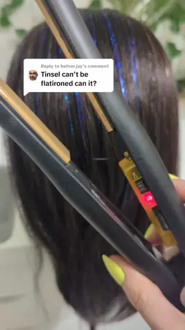 Replying to @hefner.jay yes, you can use a flat iron on tinsel. I did a few pieces to show that nothing melted or stuck together.  #fyp #tinsel #tinselhair #hair #heatproof #flatiron 