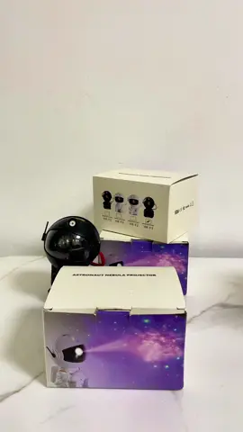 I think the black one is more attractive #christmas #gift #astronaut #starlight #projector 