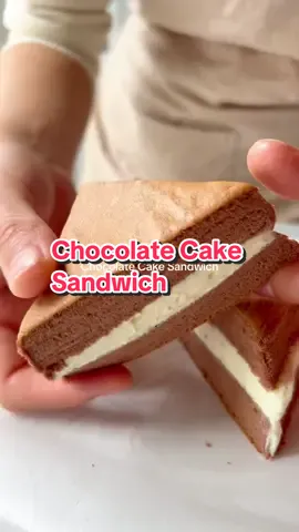 Chocolate Cake Sandwich. Recipe linked in my bio. #cakesandwich #softcake #fluffycake #fyp #viralvideo #viraltiktok #moistcake 
