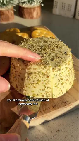 Sliceable Garlic & Herb Cashew Cheese 😍🧀🎄 I may have demolished half a block of this today with Ritz crackers and chilli jam 🫢 it is SO good! The recipe is on my website - click the link in my bio and you’ll see it. enjoy! 🎄  #vegancheese #cashewcheese #dairyfreecheese #plantbasedcheese #veganchristmas 