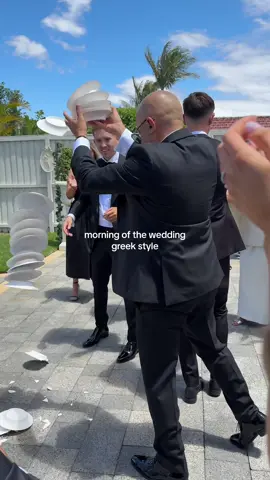 smashing plates on the morning of your wedding, opaaa!  #greekweddingsbelike #greekweddings #greekplatesmashing #smashingplates 