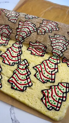 I can’t stop making Little Debbie themed desserts 😂 Enjoy this Little DebbieTree Cake Designed Swiss Roll! ❤️ Find the full recipe on my website, link in bio! #Recipe #christmascountdown #christmasrecipes #thesqueakymixer #christmastiktok #recipes #christmascake #christmasrecipe #cakerecipe #swissroll #cake #littledebbiechristmastreecakes 
