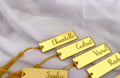 Add a touch of sophistication to your wedding decor with our Personalized Acrylic Mirror Tags. These elegant tags serve as stylish place markers, enhancing your table settings with a personalized touch. Crafted with precision, these mirror tags elevate the aesthetics of your event, making each guest feel truly special. Create an enchanting ambiance with our Custom Name Tags, a perfect blend of functionality and glamour for your wedding celebration. #gift #giftideas #personalisedgifts #customtag #acrylic #acrylicmirror #plexiglass #weddingdecor #wedding #wedding #acrylicnametags #nametag #weddingplanning #weddingplanner #eventmanagement 