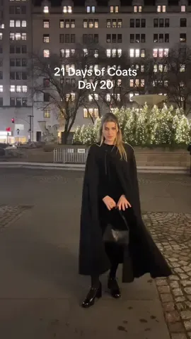 Capes deserve more love. This one is vintage from the 1960s and I’ve gotten so much wear out of it 🦇 Also if I could bottle up New York during the holidays  ♥️ #21DaysofCoats #fashiontiktok #capes #allblackoutfit #saintlaurent #winteroutfits 