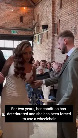 Emotion and tears!  The bride stands up on her wedding day!  She suffers from an illness that has confined her to a wheelchair.  Waldmann disease is a rare disorder that causes lymph to leak into the intestines #trend #wedding #bride #willyoumarryme #groom #marriage #viral #trend #trending  #weddingtiktok #Love 
