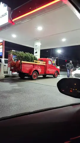 a little red truck hauling a Christmas tree!#christmas #littleredtruckhaulingachristmastree #littleredtruck #stjohns #newfoundland 