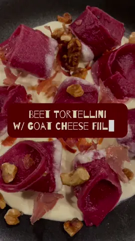 Beet tortellini with a whipped goat cheese filling and goat cheese cream sauce 🧀 I top the dish with some crispy proscuitto and toasted walnuts. This was honestly so good, definitley a recipe I am going to keep around and definitely something that would impress people  #pasta #tortellini #goatcheese #lemon #yummy #fyp #Recipe #dinnerparty #dinnerpartyrecipes #funrecipes #beet #tasty #parmesan #christmastraditons #charcuterie #holidaybaking #holidayfood #holidayrecipe 