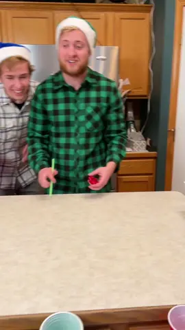 Blow the Bow in the Cup!! pt.2🎄🎁 #fyp #games #familygamenight #christmas #christmasparty #partygames #familygathering 