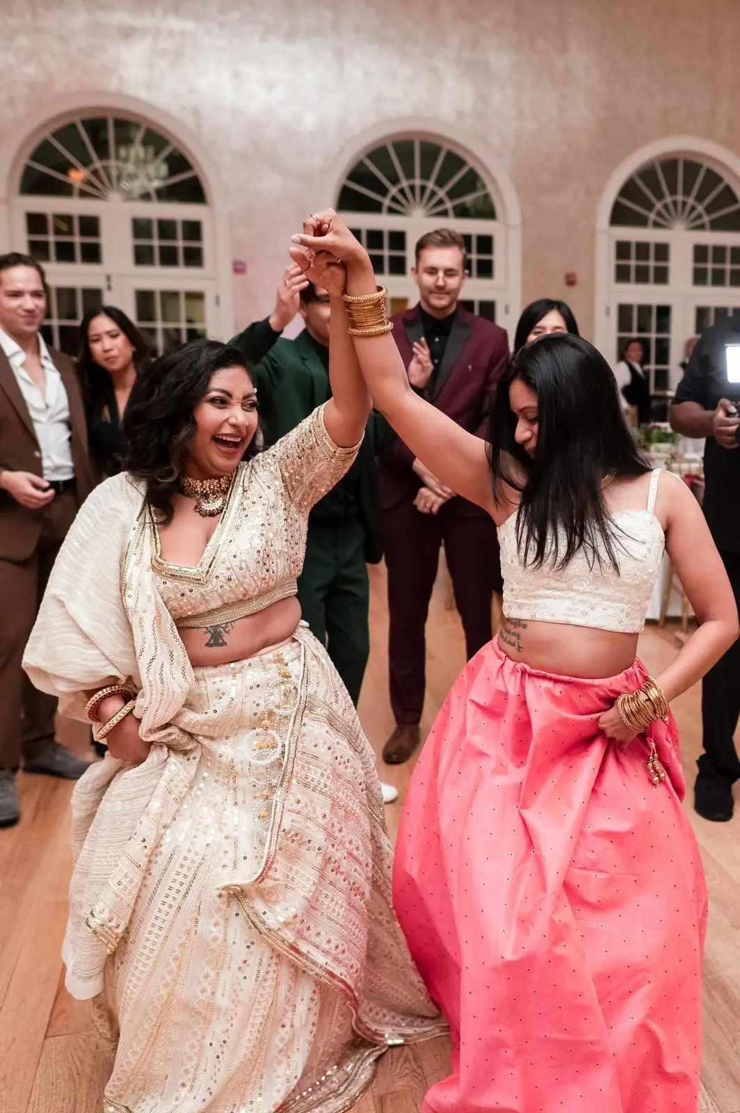 This bride and her squad started practicing with our tutorials in June and a few sessions later, they were on the dancr floor by August! You don’t need numerous practices if you have us in your back pocket 💃  Eliminate the need for traveling to your studio or trying to learn last minute dances for your next event! With ZIND tutorials our lessons are up to date and instantly available! We create simple steps that anyone can learn in 15 -20 minutes. You don't need any dance experience or formal training - we've got you covered. This is great for bridal parties, family dances who need to learn something simple and quick while still looking like professional dancers on the dance floor! Getting ready for a Sangeet, reception, or big event and don't have time to find songs, learn, choreograph/record and teach everyone in different parts of the country? No problem, that's where we step in so you never have to worry about choreographing or teaching.  Get everyone on board to learn a quick routine online to your favorite Bollywood song in 20 minutes or less.  Visit the link in our bio to sign up for a free trial to access the platform! #weddingtutorial #bollywooddance #bollywooddancetutorial #bollywooddanceclass #bollywoodweddingdance #weddingdance #fyp #dancetutorial #zind #weddingdancetutorial #sangeet #sangeetdances 