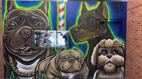 Its a dog eat dog world out there but its all love in here. ✨🐶🐾🐕🦴✨ Mural painted in 26 hours over a period of 3 days just in time for the holidays. Bless. 