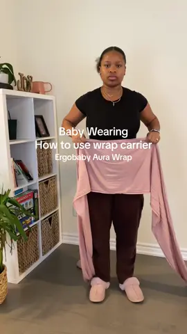 My baby girl loves being held and without this wrap, I wouldn’t be able to get anything done! This one is the Ergobaby Aura Wrap and I purchased it on Amazon. #babywearing #babywraptutorial #amazonfinds #pregnancy 