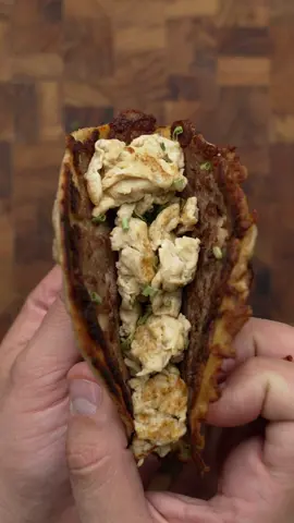 Throwback to one of best Breakfast tacos I’ve ever had!! This was a really fun cook inspired by two incredible creators , @chilesandsmoke and @Bo !  If you’re looking for a fun breakfast idea this week, it’s hands down, a must try!  For the Custard: 3 eggs 1/2 cup heavy whipping cream 1/2 cup milk 2 tsp vanilla extract 1 tsp ground cinnamon 1 tbsp sugar - optional for this! 2 tbsp butter Flour tortillas Breakfast sausage Pattie’s Additional eggs for scrambling Maple syrup Chives Start by mixing the custard ingredients together and whisking until smooth! Set this aside and melt 2 tbsp of butter in a pan over medium high heat.  When the pan is hot, place down the breakfast sausage patty, then dip a flour tortilla in the French Toast Custard before placing it over the top of the sausage.  Now just like with a smash burger, use parchment paper to avoid sticking and smash it down flat. Let this cook for 2-3 minutes on the first side, then flip and cook for 30-45 seconds. Finish the taco by filling it with whatever you like! I really enjoyed the version I showed in this video and highly recommend it!  Pans - @HexClad  Eggs - @Happy Egg Co. USA  Cutting board - @Dalstrong 🔪  Camera & lens - @Sony Alpha  #breakfasttacos #frenchtoasttacos #frenchtoastrecipe #breakfasthack #breakfastideas #familymealideas #breakfastrecipes #smashedbreakfasttaco #breakfasttacorecipe #breakfasttime #breakfastfood #breakfastlover #fyp #foryou #food #Foodie #cookwithme #alfskitchen 