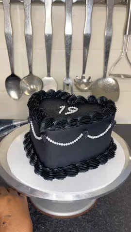 Can we just acknowledge how BEAUTIFUL this customer is!! I love that she trusted me to body this cake without even seeing the finished product🤞🏾🖤 . . . #kutiwacakes #cake #caketok #caketiktok #birthdaycake #pretty #prettycake #cakedecorating  #cakedecorator #cakedesign #cakeinspiration #cakeinspo #cakeidea #heartcake #blackbuttercream #blackcake #blackcakedesign #glitter #glittercake #beadedcake #leavetheworldbehind #manchestercakes #piping #pipingvideo #like #cakevideo #tutorial #caketutorial #fyp #sparkle #satisfying #satisfyingvideo #foryou #19th #19thbirthday #cakeideas #easycakedesign #simplecakedesign #glam #glamcake #nightmode #lowexposure #reactionvideo 