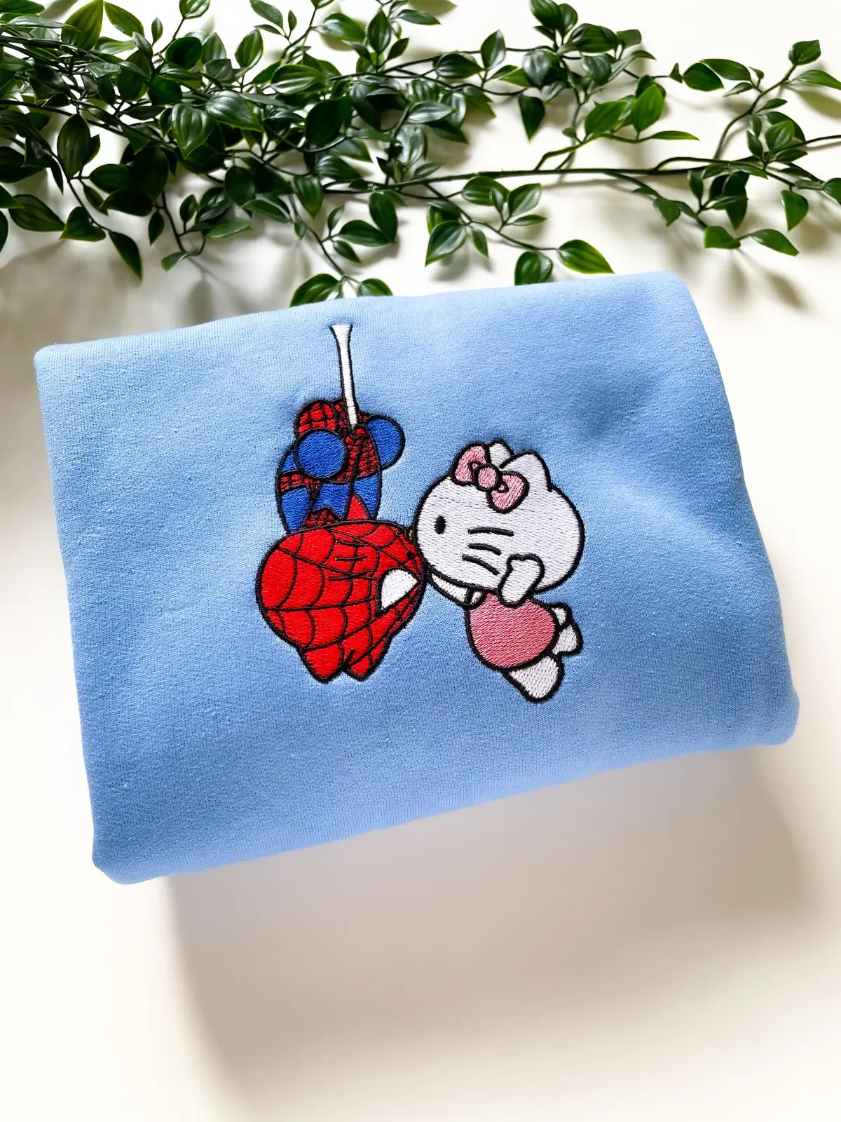 Me and who? 😍 Discount code “TIKTOK” to save 10% on your order!  Get ready for valentines day with your boo with this cute matching spiderman and hello kitty sweater!  Available now at the link in bio!  #spiderman #hellokitty #fyp #giftideas 