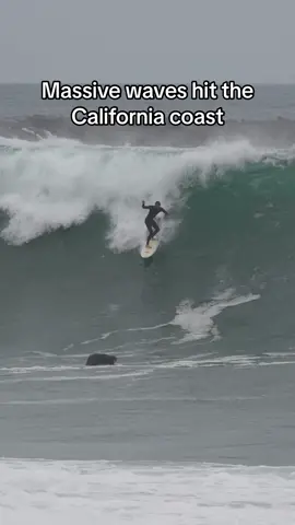 Surfers take on massive waves as it hits the califronia coast during this swell 🌊 🏄‍♂️ #fyp #foryou #waves #surf #surfing #ocean #firing #bigwaves #slabs #northsea #surftok 