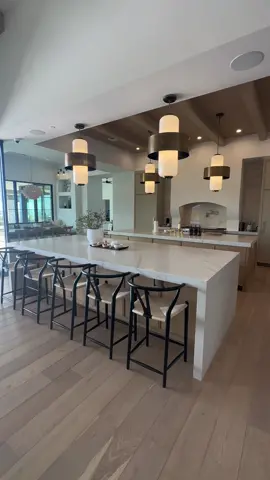This incredible kitchen features, a double island, metal cabinetry, a plaster kitchen hood, and so many other details #fyp  #Kitchen #KitchenDesign #hood #AFTConstruction #Design #InteriorDesign #Island