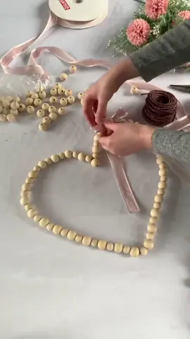 GO to my Profile + tap 🔗 + type “DIY Wood Bead Heart” into the search bar.  This is one of the most popular Valentine’s Day DIY tutorials on my blog!  Finding wire that could hold the weight of the beads was a bit tricky, but after some trial and error, I found the right one.  I wanted to add a little Valentine’s color to it so I added a pink velvet bow on one side. If you love this DIY Wood Bead Heart and are excited for more Valentine’s tutorials, this is only week one!  I have 6 more weeks of love-filled tutorials coming your way! 💗