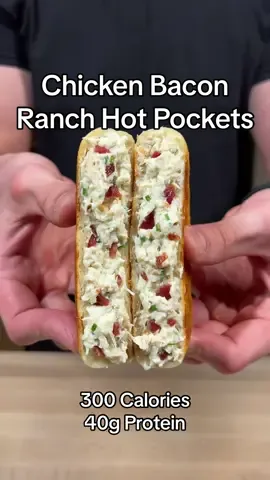 Chicken Bacon Ranch Hot Pockets  (Makes 8 Hot Pockets)  If you like this recipe, make sure to check out my digital cookbook that has 100+ delicious recipes like this one! Your support means that I can continue posting these recipe on my page for free. Link in my bio!  Macros:  - 300 Calories - 40g Protein  - 28g Carbs  - 4g Fat  Ingredients (Filling): - 1 Cup Cottage Cheese (0% Fat)  - 2 Tbsps Ranch Seasoning  - 2 Tbsps Light Mayo  - 1/4 Fat Free Milk  - 24oz Rotisserie Chicken Breast  - 3 Cups Fat Free Mozzarella  - 4 Center Cut Bacon Strips (Cooked)  - Fresh Chives  Ingredients (Dough):  - 2 Cups Self Rising Flour  - 1 Cup Greek Yogurt (0% Fat)  - Garlic Salt  #cooking #food #Fitness #weightloss 