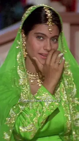 Shah Rukh Khan and Kajol performing the classic song 