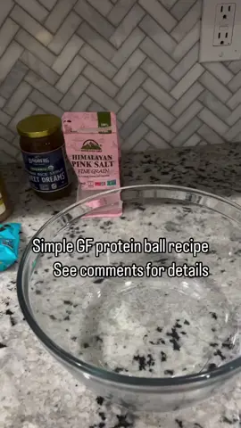 GF protein balls 💪🏻  • I will be snagging some of these for quick morning and afternoon snacks 😋  • 2 cups rolled oats (if strict GF make sure your oats say GF on them. We had GV brand left over and I’m not about to waste food with the prices that groceries are so I used up the last we had in this recipe) 2 scoops protein powder (I love the NAKED brand as it’s literally only whey protein concentrate. It mixes well and I can add whatever to flavor depending on my mood) 1/2 c. Mini choc chips ( I used enjoy life brand as it only has cane sugar, chocolate and cocoa butter) 1 tsp Himalayan salt (or regular sea salt) MIX DRY INGREDIENTS On stovetop heat 1/2 cup brown rice syrup (I had to buy this one online because I couldn’t find locally. It definitely helps the protein balls stick together better than honey. You can also substitute honey. However, I was out and prefer to buy locally sourced honey as much as possible) 1/2 c nut butter (I used peanut butter with literally the only ingredient peanuts. You can use any nut butter you have or prefer) Heat until well incorporated over medium heat. Mix continuously. MIX ALL TOGETHER (using your hands is easiest) and form bite sized balls.  • Can be frozen, refrigerated, or left on the counter in sealed container, if planning to eat within the week.  • Comment 😋 if you’re planning on trying the recipe in the comments!  • #smallchanges #wholeeating #glutenfree #proteinballsrecipe #proteinballshomemade #newyearresolution #healthylifestyle #healthy
