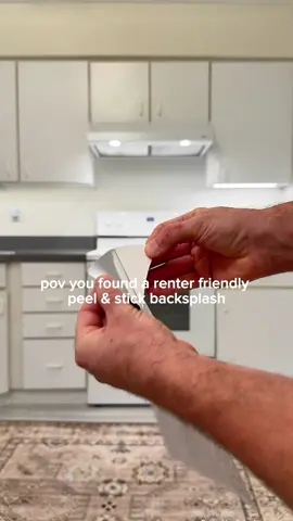 Renter Friendly Kitchen Refresh: Part II🤌 Peel and Stick Backsplash Tile 💡 These are linked 🔗 We recently found these realistic looking tiles that are completely peel and stick and we were both immediately sold. I’m so glad that companies are making more renter friendly options 🙌 The most tedious part of installing this was having to measure and cut the tile to fit the space perfectly. Other than that you just peel off the back and press it onto the wall and that’s it. Next up we are swapping out the cabinet handles. 👌 #homedecor #neutralkitchen #kitchenstyling #renterfriendly #kitcheninspo #kitchendecor #rentaldecor #neutralhomedecor #renters #neutralstyle #peelandstick #homeupdates #CleanTok #cleaning #beforeandafter #kitchenmakeover #renter 