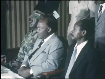 A youthful Museven seated next to president Binayisa in 1979. #foryoupage #fypシ゚viral#uganda #duet #mkproject  #eastafrica 