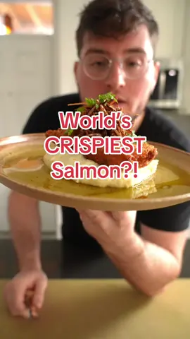 Parm-Crusted Salmon with Crispy Leeks! Here’s a simple preparation to elevate your salmon at the crib AND a low-lift tip to make your food look really really nice. I hope you dig! 🤘🏼 Adam Salmon Ingredients: 6 oz fillet of @Bluehouse Salmon  1 cup Fresh Breadcrumbs (or Panko) 1/2 cup Parmesan Cheese, grated Neutral Oil, for frying Black Pepper, to taste Kosher Salt, to taste 1. Prepare 3 bowls. In the first bowl add a 1/2 cup of all-purpose flour, in the second add a whisked egg and dash of water, then in the third and final bowl mix the breadcrumbs and parmesan cheese together. 2. Bring 2-3 inches of oil up to 350F on medium-high heat. 3. Season the salmon with salt the coat in the flour, egg wash and finally the seasoned breadcrumbs. 4. Fry the fish until golden brown then flip and repeat, about 2-3 minutes per side. 5. Serve alongside your favorite side dishes and garnish with fresh herbs. #salmon #bluehousesalmon #sustainablefish #sustainablefood #cooking #EasyRecipes #salmonrecipes 