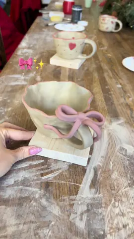 Your sign to make cute clay mugs 🎀✨ #claymug #pinkbows #pottery #claymugaesthetic #potterytiktok #claytutorial #DIY #ceramics #girlhood #ceramicmug #heartmug #cutemug #aesthetic #paintingclay #handmade #craft #mushroommug #cutecup #potteryclass #airdryclay #girlhobbies #pinkaesthetic #itgirl #fyp #xyzbca 