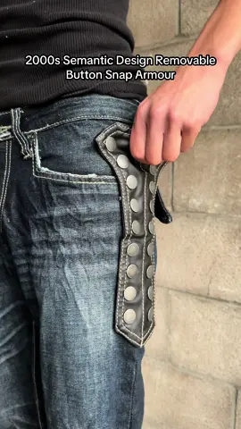2000s Semantic Design Removable Button Snap ‘Armour’ Denim 🛡️⚔️ Debuting in the 2000s era, this pair of denim comes equipped with dual wield button snap closures on the waist and an indigo wash. Removable in a pinch, the black leather details provide protection during impromptu medieval warfare. A true essential.  #semanticdesign #semanticdesignsecond #techwear #functionoverform #functionoverfashion #fashionoverfunction #techwearfashion #archive #archivefashion #fashion #denim #style 