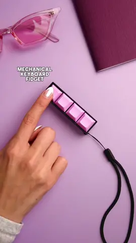 Here’s a fidget that sounds and feels like a mechanical keyboard ⌨️ This is our mechanical keyboard fidget, which is 3D printed and assembled in California🌴 Works as a keychainand contains Gateron keyboard switches. Do you like clicky or quiet? Choose the keyboard switch, the base color, and the keycap color. It's the perfect fidget if you love tapping on mechanical keyboards Great for stress relief, ADHD, anxiety, or autism. Featured in this video is our clicky fidget with lavender keycaps and a black base. #keyboardkeychain #fidgetkeychain #keyboardfidget #mechanicalkeyboard #TikTokShop #keyboardclicking #keyboardasmr #StressRelief