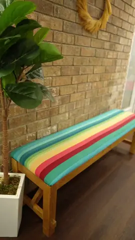 Added some color to this bench I got at the thrift store!  💛 I wasn’t a fan of the dark wood stain, so I decided to go lighter. I used Citristrip and plastic wrap to speed up the wood stain removal process. After scrapping off the old stain, I sanded the surface and re-stained it. Lastly, I upholstered the bench with some cute colorful fabric to match my theme 🥰 What do you think of the final project?? #thriftflip #thrifted #transformation #diyproject #satysfying #citristrip #upholstery #DIY #howto  