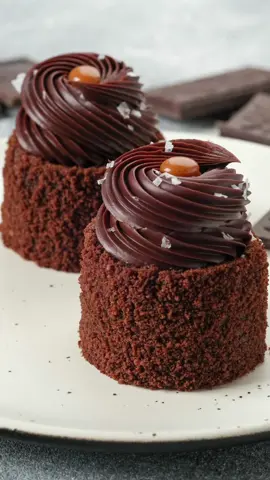 If you’re a true chocolate enthusiast, then the «Chocolate Passion Cookbook: 9 Perfectly Delicious Pastries for Chocolate Lovers» is a must-have addition to your kitchen arsenal 🍫✨. Presented by KICA Edition, this cookbook is a tantalizing invitation to explore the enchanting world of chocolate and elevate your holiday baking game. Inside the pages of the «Chocolate Passion Cookbook,» you’ll discover a treasure trove of chocolate-infused delights that will leave you and your loved ones craving for more. Each recipe is a work of art, meticulously crafted to ensure that every bite is a moment of pure chocolate bliss 🤩. Here’s what you’ll find in the book: 1. Mulled Wine and Chocolate Cake 2. Chocolate and Caramel Individual Cakes  3. Chocolate Pie with Almond Praline 4. Coffee and Chocolate Mini Cheesecakes 5. Brownie Cookies 6. Dark Chocolate Mousse Cake 7. Sour Cherry and Chocolate Choux 8. Whoopie Pie Cookies 9. Chocolate and Caramel Madeleine Cake Each recipe is meticulously crafted and accompanied by detailed instructions and insightful short videos, ensuring that your baking experience is as rewarding as it is delicious 🙌🏼.  Follow the link in my profile description to get the book at a special price 🔥. In this video, enjoy Chocolate and Caramel Individual Cakes 🍰😍.  #kica #kicaacademy #chocolate #dessert #recipebook #Recipe #pastry #pastrychef #kicarecipe #kicaedition #ivanetspastry #book #baking #fyp 