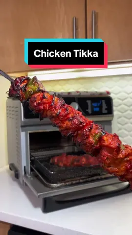 I love chicken tikka skewers. Easy and delicious.🍢🐔 Ingredients: 	•	2-3 chicken thighs, cubed 	•	2 tablespoons Greek yogurt 	•	1 tablespoon ginger paste 	•	1 tablespoon garlic paste 	•	1 tablespoon chili powder 	•	1 tablespoon cumin 	•	1 tablespoon coriander 	•	Salt to taste 	•	1 tablespoon lemon juice 	•	1 tablespoon oil 	•	Red food coloring (optional) 	•	Red and green bell peppers, cubed Marination: Combine cubed chicken thighs with Greek yogurt, ginger paste, garlic paste, chili powder, cumin, coriander, salt, lemon juice, and oil. Optionally, add red food coloring. Allow it to marinate for 1-2 hours or overnight for enhanced flavor. Skewering: Thread marinated chicken cubes and cubed bell peppers alternately onto skewers. Airfrying: Preheat the air fryer to 450°F (232°C). Airfry skewers for 17-20 minutes, flipping after 10 minutes. Mix leftover marinade with ghee and use it to brush on top while cooking. Wait for a delightful char on the chicken. Remove from the air fryer. Finally: In a separate pan, fry the chicken with butter, kasuri methi, chat masala, and heavy whipping cream. Garnish with cilantro. #FoodTok #browntiktok #desi #desifood #chickenskewers #chickentikka #indianappetizers  #indianstyle #brownfood #browntok #brownguy #foodasmr #best #chickentikkarecipe #multiculturalcouple #coupletok #fypfood #india #southasian #pak #bangladesh #nepal 