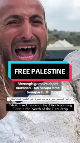Seorang rakyat Palestin menangis kegembiraan selepas menerima tepung di Gaza selepas keadaan hidup di bandar dan utaranya mencapai tahap 