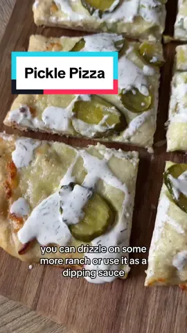 You don’t even need to like pickles to LOVE this pickle pizza because yes it’s that good 🍕🍕🍕🍕 another great addition to your SUPER BOWL SPREAD  Should probs be a ranch ran though. #picklepizza #pizzarecipes #superbowlspread #gamedayrecipes #gamedaysnacks #superbowlsnacks #homemadepizza #traderjoespizzadough 