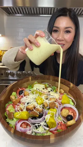 Here’s a copycat recipe of Olive Garden’s Salad! The salad dressing ingredients are 1/3 cup olive oil, 1/3 cup vinegar, 1/4 water, 1 packet of zesty Italian seasoning, 2 ounces of parmesan cheese, 1 tbsp of dijon mustard, 1 tsp of garlic powder, 1 tbsp of sugar and 2 tbsp of mayo. For the salad you need romaine lettuce, tomatoes, red onions, black olives, peperoncini’s, croutons and parmesan cheese. #olivegardensalad #copycatolivegarden #saladrecipe 