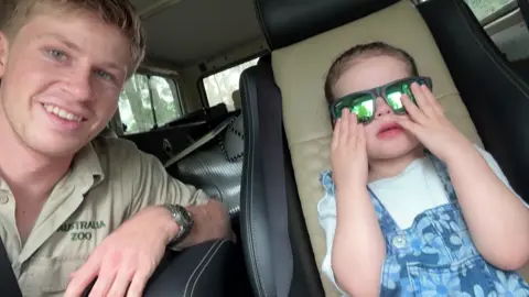 On these warm days, Grace loves chilling in the parked car, aircon on blast in the driveway… trying out some high-fashion looks 😎