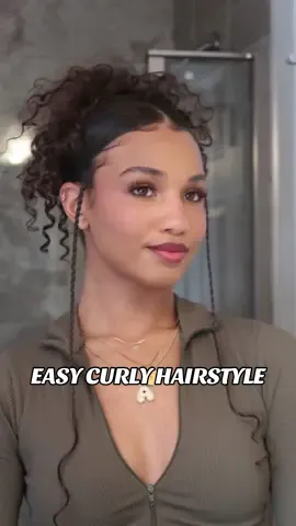 The side braids add a cute touch to this easy claw clip style! - Full tutorial on my YouTube. 💚 #curlyhairstyles #easyhairstyle 