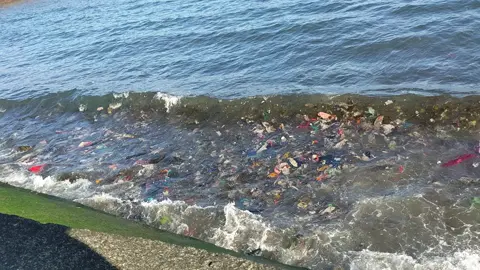 February 2, 2024   Sto Domingo Albay Philippines Waterfront   Ocean trash washed up by the waves