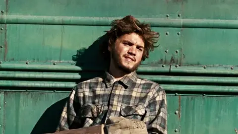 Into the Wild (2007) directed by Sean Penn. It is an adaptation of the 1996 non-fiction book of the same name written by Jon Krakauer and tells the story of Christopher McCandless (
