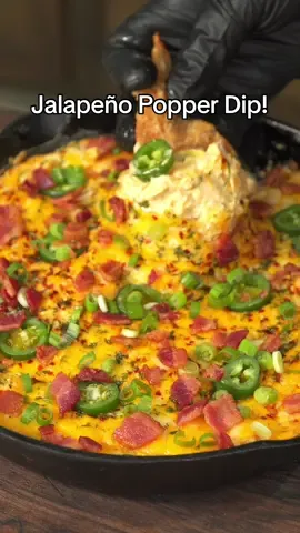 Jalapeño Popper Dip  (Who’s winning the Super Bowl??) • Ingredients -  400F for 11 Minutes  ———— Yellow Onion (Half) 3 Cloves Garlic 2 Jalapeños 7-8 Strips Bacon 8 oz Cheddar Cheese 8 oz Cream Cheese  1 Cup Sour Cream Top with mix Mozzarella & Cheddar Cheese Scallions  Reserve 1 Tbsp Bacon Oil for Garlic and Onions ————————— Seasoning -  1 Tsp Onion Powder 1 Tsp Garlic Powder 1/2 Tsp Paprika Pinch Red Chili Flakes 2 Tsp Cajun Seasoning  —————— #thatsavagekitchen #jalapenopoppers #superbowlsunday #SuperBowl #food #football #appetizer #thatsavagekitchen 