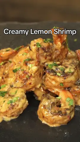 Creamy lemon Shrimp (What would you pair this with??) • Check out Dano’s new Sea-Soning  @Dan-O’s Seasoning #dontbesalty #danospartner #freestylecooking • Ingredients -  1 Lb Shrimp  1 Tbsp Dano’s Sea-Soning  ——— Sauce  2 Tbsp Butter  Tarragon  1 Whole Shallot  3 Cloves Garlic 1/4 White Wine/ Stock 1 1/2 Cup Heavy Cream 1/3 Cup Parmesan Cheese 1 Whole Lemon  ——————— #thatsavagekitchen #shrimp #seafood #shrimptok #seafoodlovers 