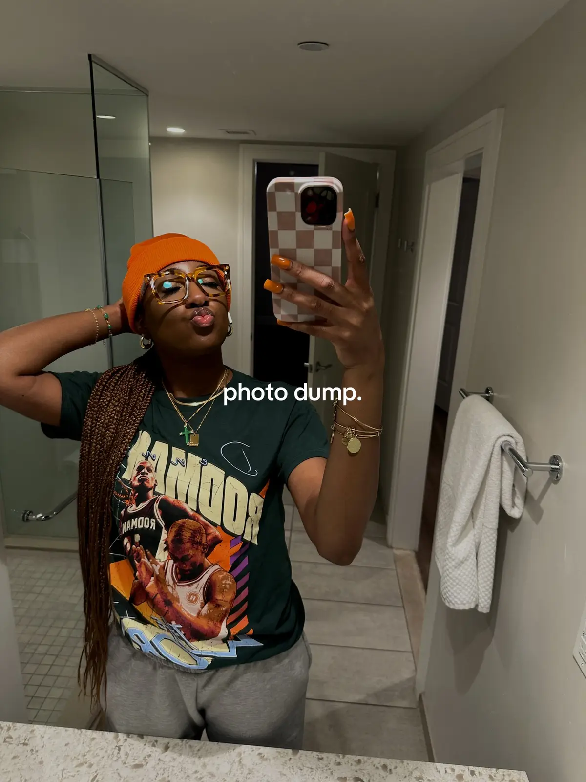 two with a twist. 🧸🧡 Sweatsuit: @prettylittlething  Rodman tee: @pacsun  Sweatpants: @boohoo  Shoes: @New Balance 9060 , don’t know the dunks 🥲 Toboggan: hairstore Phone case: @Velvet Caviar  #outfit #outfitinspo #tallgirlfashion #tallgirlstyle #streetwear #blackgirltiktok #blackgirlfashion #blackgirlfashion #winterfashion #photostory #jasminekico 