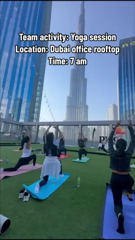 Balancing our chakras with a Burj Khalifa view🧘✨ #pwcmiddleeast #yogaflow 