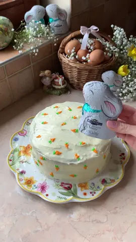 #GhirardelliPartner Easter vibes just got sweeter with @Ghirardelli Chocolate Company’s Easter bunny magic on my carrot cake masterpiece! 🐰🥕  Be sure to pick up the #Ghirardelli Easter bunny to elevate your Easter treats!  #ABiteBetter #easter #eastersweets #baking #carrotcake #Recipe #tiktokfood #easterbaking 